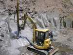 EEI CanAm Excavator Hydraulic Rock Drill at Work (177_G)